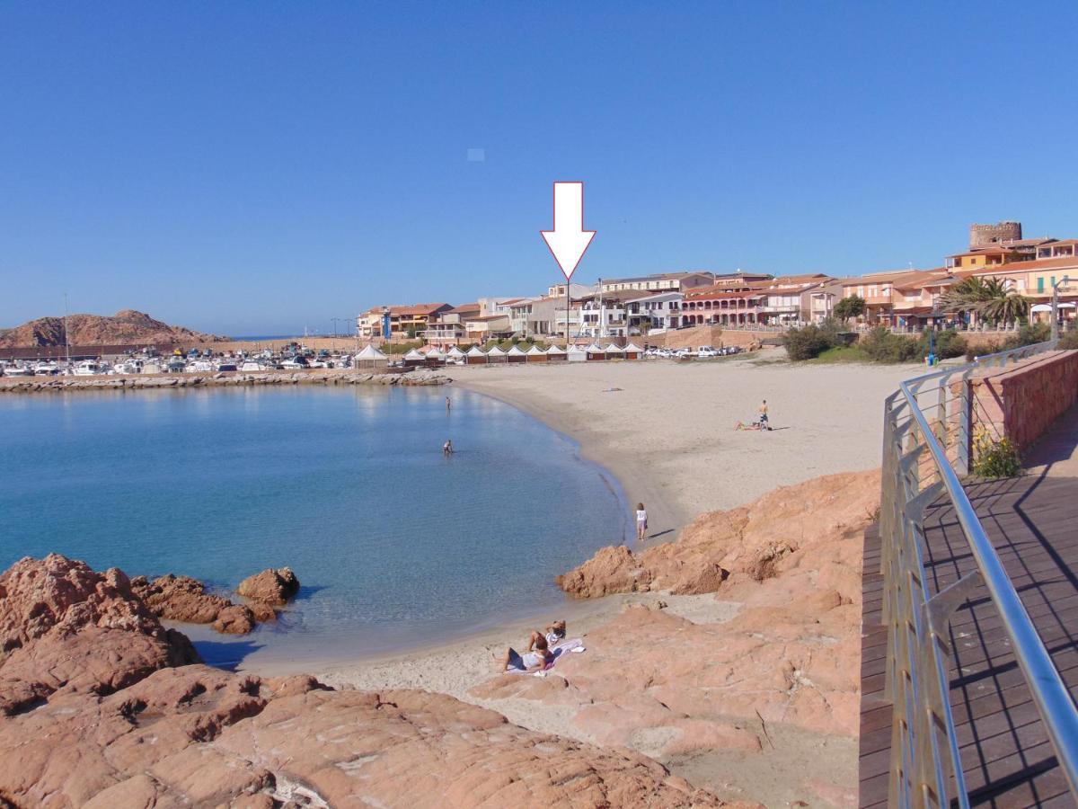 Appartamento Fronte mare attico indipendente ed esclusivo con terrazza panoramica Isola Rossa Esterno foto