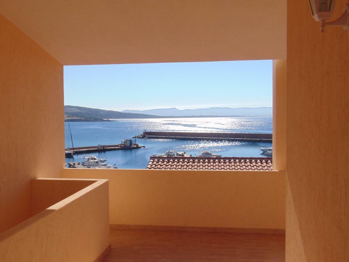 Appartamento Fronte mare attico indipendente ed esclusivo con terrazza panoramica Isola Rossa Esterno foto
